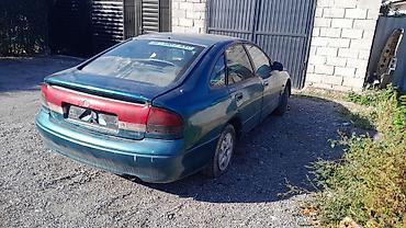 Mazda: Mazda 626: 1994 г., 1.8 л, Механика, Бензин, Хэтчбэк — 4