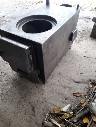 Котлы: Твердотопливный водогрейный котёл с варочной поверхностью Описание: - — 6