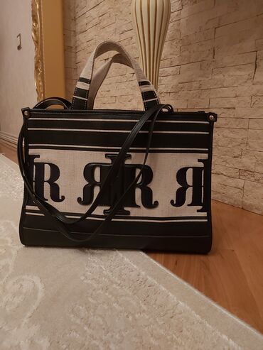 RIVER ISLAND CANTA