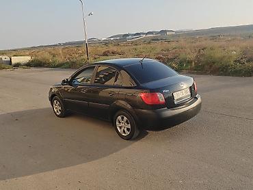 volkswagen passat 1: Kia Rio: 1.4 л | 2008 г. Седан — 4