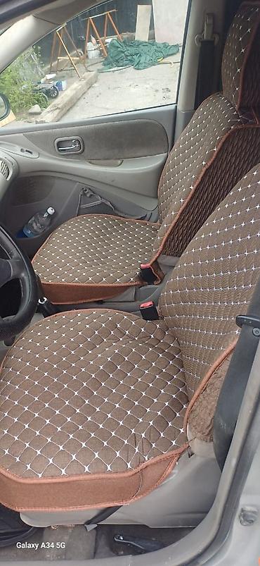 devo tiko: Nissan Almera Tino: 2001 г., 1.8 л, Механика, Бензин, Хэтчбэк — 7