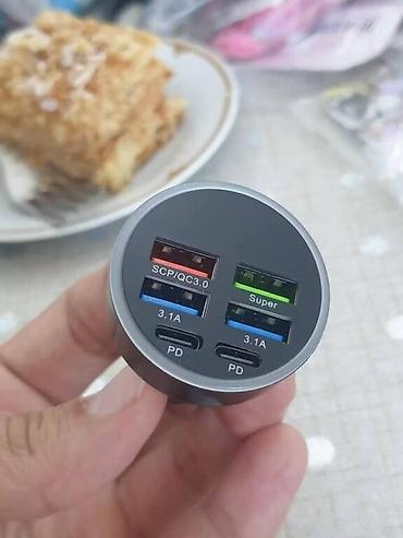 volta vs 1: Avtomobillər üçün 6 portlu işıqlı şarj cihazı yenidir. Avtomobilin — 4