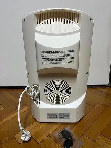 Ostali aparati za negu lica: Solarijum lampa za lice (kućni mini-facial tanner) Opis: - Kompaktna — 7