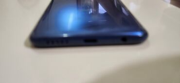 telefon ucun sekiller: Xiaomi Redmi Note 9, 64 ГБ, цвет - Голубой, 
 Сенсорный, Отпечаток пальца, Face ID