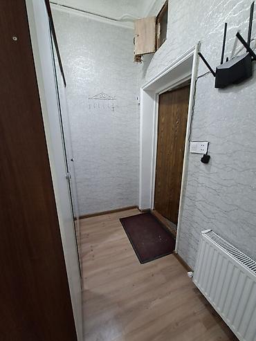 bakıda kreditle evler: 2 mərtəbəli binanın 1ci mərtəbəsi,qanuni 2 otaqlı,43kv+27kv artırma — 1