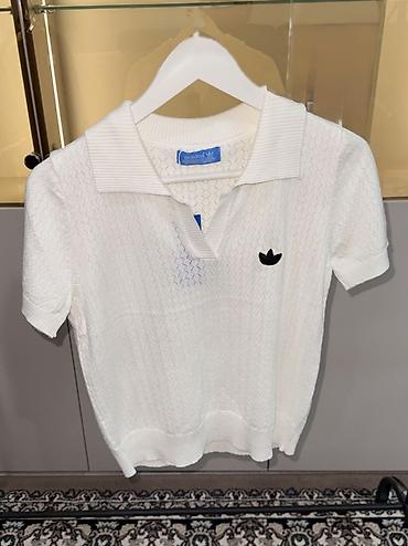 nike tech flecce: Трикотажное поло adidas - Модель: укороченное поло с отложным — 1