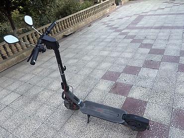 ninebot e2 pro: Segway elektrik skuter. Yenidir. 1 ay işlənib Şəkillərdə qara rəngli — 2