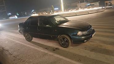 автомобиль пассат: Daewoo Nexia: 2002 г., Кол менен иштөөчү, Бензин — 4