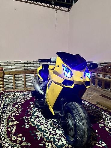 dəmir yumruq rəsmi: Uşaq üçün elektrikli motosiklet – idman üslublu, 2 təkərli model — 3