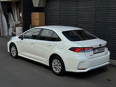 byd 06 ev: Toyota Corolla: 2021 г., 1.8 л, Вариатор, Гибрид, Седан — 5