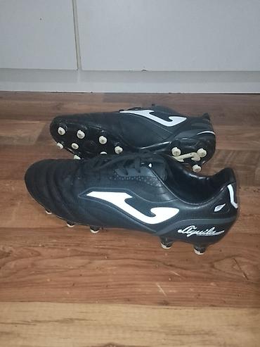 Kopačke: Kopačke Joma Aguila – crno‑bele - Model: Joma Aguila (logo i natpis — 3