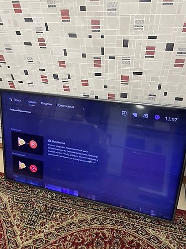macbook 16: Телевизор KIVI, диагональ экрана около 55" (по габаритам корпуса) — 2