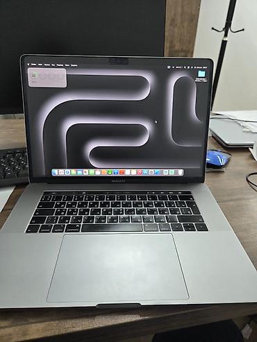 MacBook Pro 15" (2019) — yüksək performanslı peşəkar noutbuk Texniki