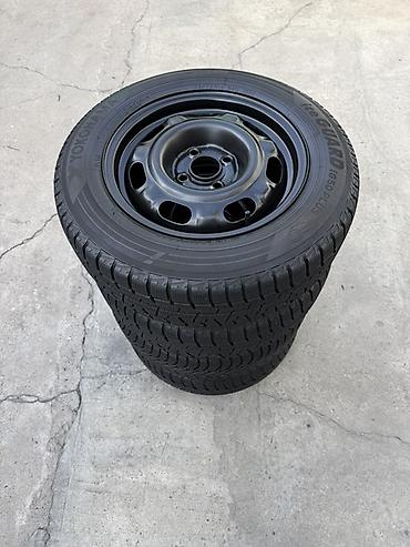 trunk q: Продаю комплект зимней резины с дисками Yokohama 175/70/14 стояли на — 5
