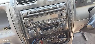 монитор на машине: Mazda Demio, 2001 г. Штатная магнитола/головное устройство для Mazda — 1