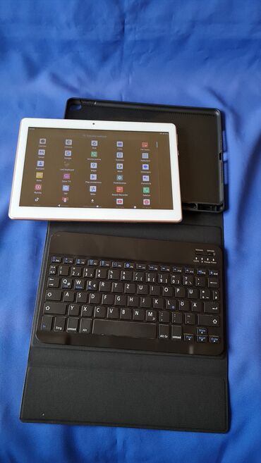 Tableti: Tablet sa maskom,blutut tastaturom, ima za 2 sim kartice, nov — 12