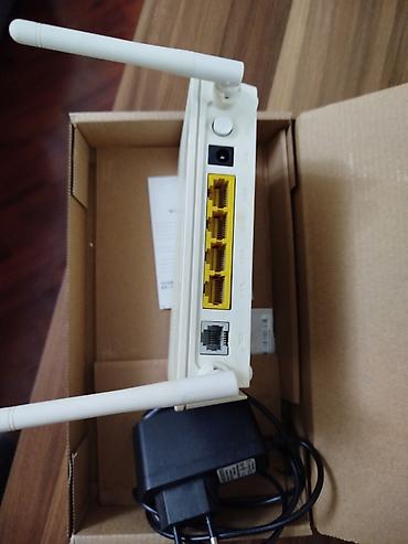 wifi modem satilir: Modem ruter satilir. lan ve optik kabelle isleyir — 4