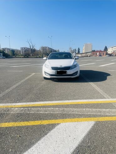 дом на колесах turbo az: Kia Optima – ağ rəngli sedan Xarici görünüş: - Ağ kuzov, aerodinamik