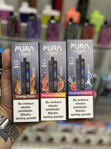 Qəlyan, vayp və aksesuarları: PURA 25.000 boll tüstülü Dad çeşidləri (qutularda göstərilən): -