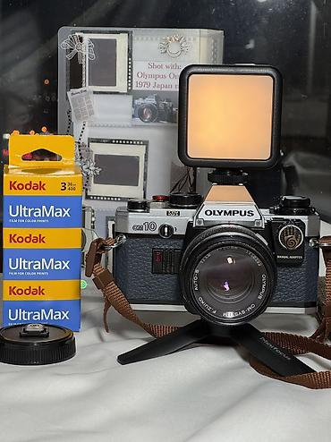 Fotokameralar: 1979-cu il Yaponiya istehsalı. Olympus OM 10 35 mm film ilə işləyən — 9