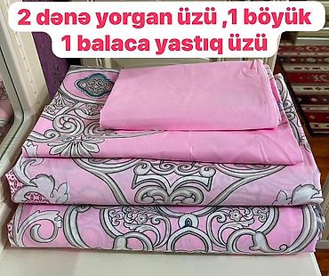 Yataq dəsti – çəhrayı rəngdə, naxışlı dizayn. Dəst tərkibi: - 2 ədəd