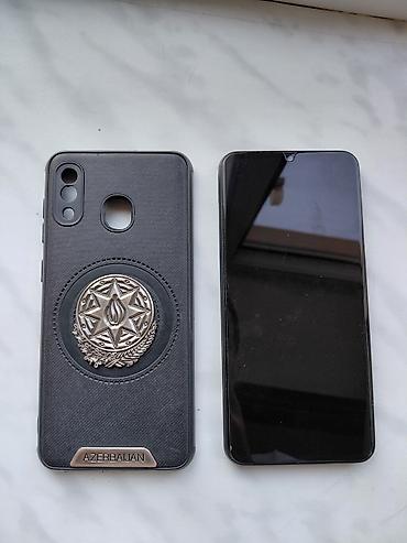 galaxy a35: Samsung Galaxy A30, 64 GB, rəng - Mavi, İki sim kartlı — 1
