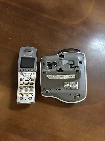 кнопкалы телефонлар: Panasonic KX-TG2050MLS simsiz ev/ofis telefonu və baza stansiyası - — 2