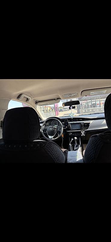 corolla 2006: Toyota Corolla, ağ rəng,sedan gövdə. I - Nömrə nişanı: 99-KY-573 — 9