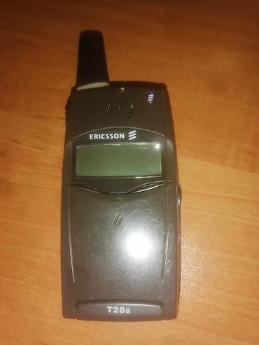kohnə telefon: Sony 2 GB, rəng - Boz, Düyməli — 1