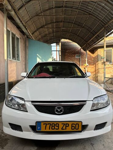 ауди 100 газ бензин: Mazda : 2003 г., 1.5 л, Автомат, Бензин