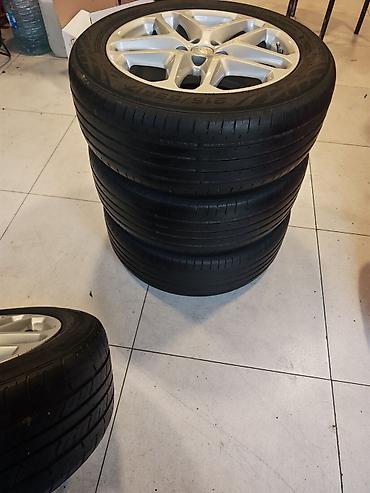 26 liq disk: 4 ədəd yığılmış təkər və disk komplekti - Disklər: gümüş rəngli — 4
