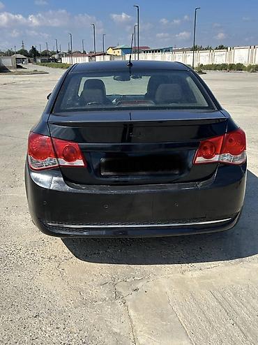 kia rio 2007: Chevrolet Cruze: 1.6 l | 2010 il 197965 km Sedan — 3