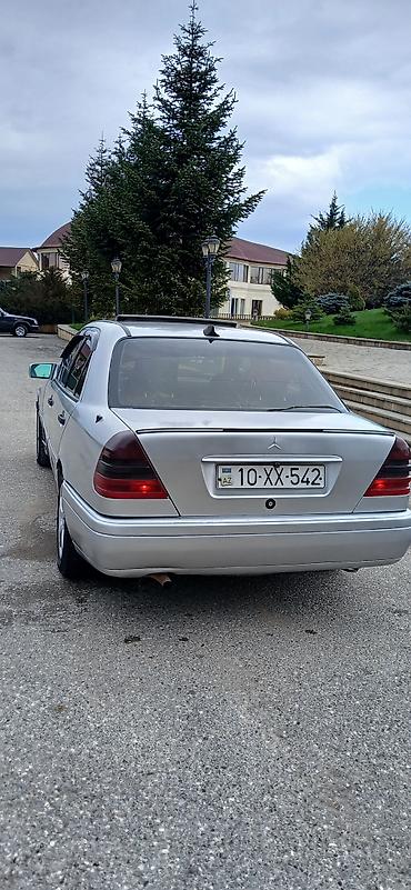 mersedes peci: Mercedes-Benz C‑Class W202 sedan – gümüş rəng. Masin yaxsi — 2