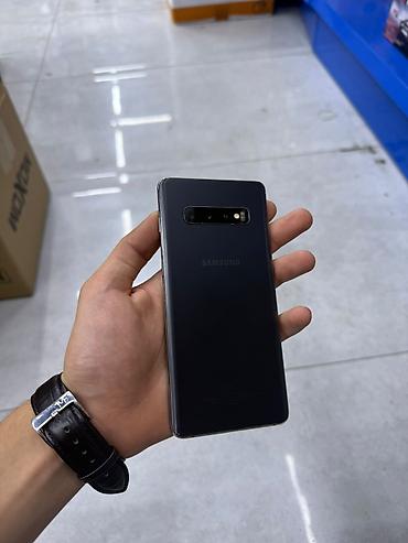 Мобильные телефоны и аксессуары: Samsung Galaxy S10 Plus, цвет - Черный, Отпечаток пальца — 1