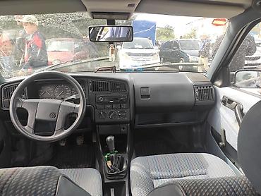 комбин: Volkswagen Passat: 1991 г., 1.8 л, Седан — 6