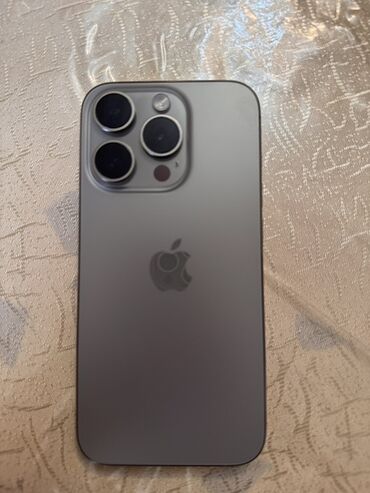 Xiaomi: IPhone 15 Pro, Natural Titanium, Face ID