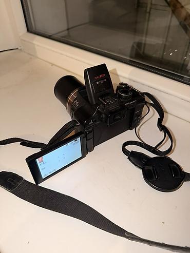 14: Panasonic Lumix DMC-FZ100 — универсальная ультразум-камера с мощной — 4