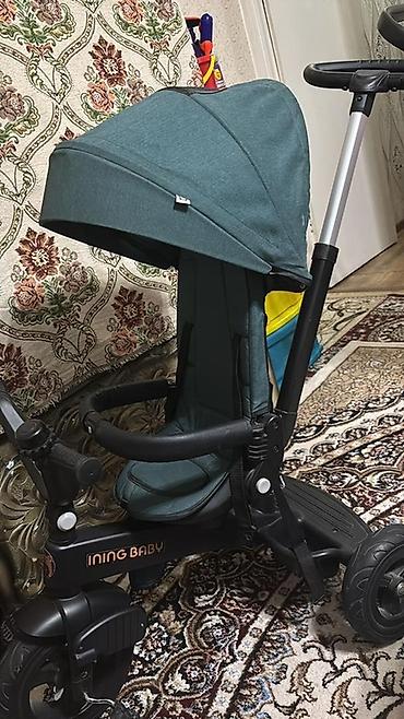 Детские велосипеды: Детский трёхколесный велосипед с сиденьем тёмно-зелёного цвета и — 5