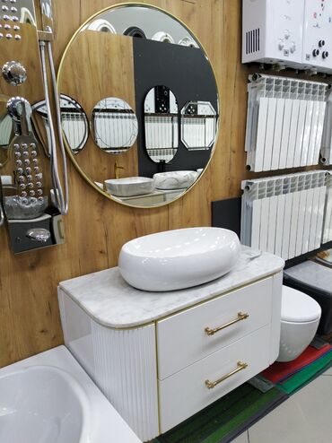 şkaf qulpları: Oval formada ağ rəngli keramika lavabo, səliqəli şəkildə quraşdırılmış