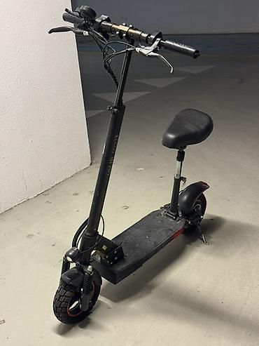 Elektrikli samokatlar: Kigoo M4 pro. Elektrikli skuter – oturacaqlı, güclü amortizasiya və — 2