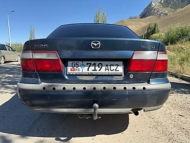 385 55: Mazda 626: 1997 г., 1.8 л, Механика, Газ, Седан — 2