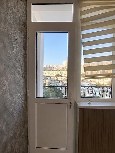 qifil: PVC balkon qapısı və pəncərə bloku təqdim olunur. Ağ rəngli — 1
