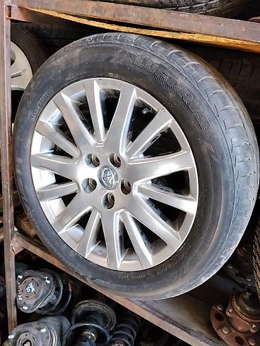 Литой диск Toyota с шиной 215/55 R17 - Оригинальный литой диск