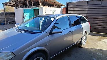 авто кызыл кыя: Nissan Primera: 2004 г., Кол менен иштөөчү, Универсал — 3