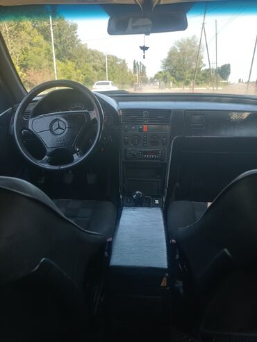 мото шлем: Mercedes-Benz C-Class: 1.8 l | 1993 il Sedan