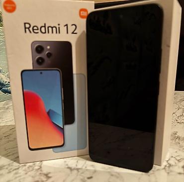 redmi 12 barter: Xiaomi Redmi 12 – smartfonsəliqəli işlənib - Model: Redmi 12 - — 1