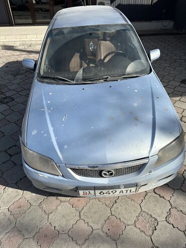 mazda demio старый кузов: Mazda 323: 2001 г., 1.6 л, Механика, Бензин, Хэтчбэк