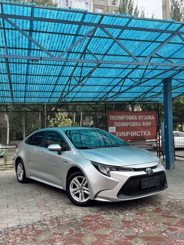 tayota runx: Toyota Corolla: 2020 г., 1.8 л, Автомат, Гибрид, Седан
