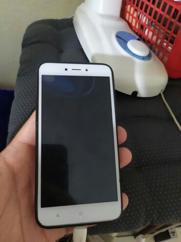 Электроника: Xiaomi Redmi 4X | 16 ГБ цвет - Молочный | Сенсорный, Отпечаток пальца, Две SIM карты