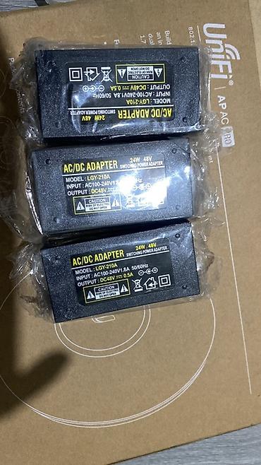 ana plata: Məhsul: Ubiquiti UniFi aksesuar dəsti və 48V AC/DC adapterlər Tərkibi — 2